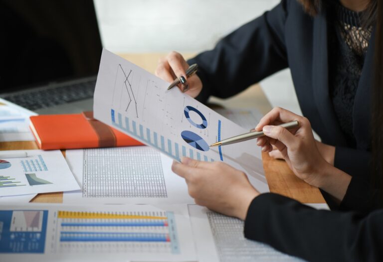 female-accountant-team-is-analyzing-data-documents-in-the-office.jpg