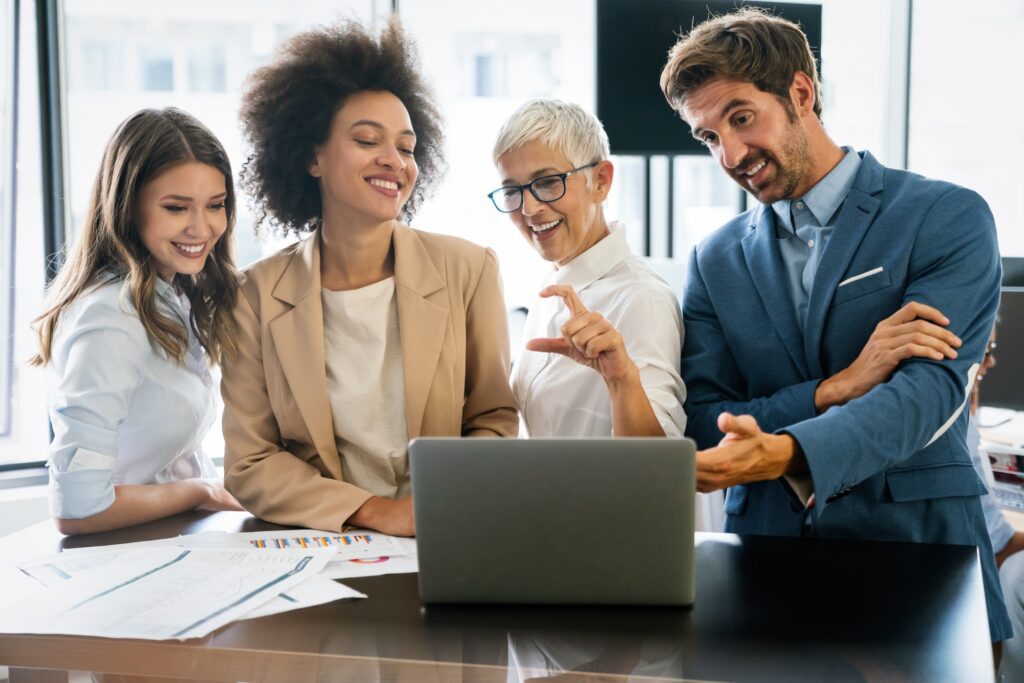 portrait-of-successful-business-team-working-in-office.jpg